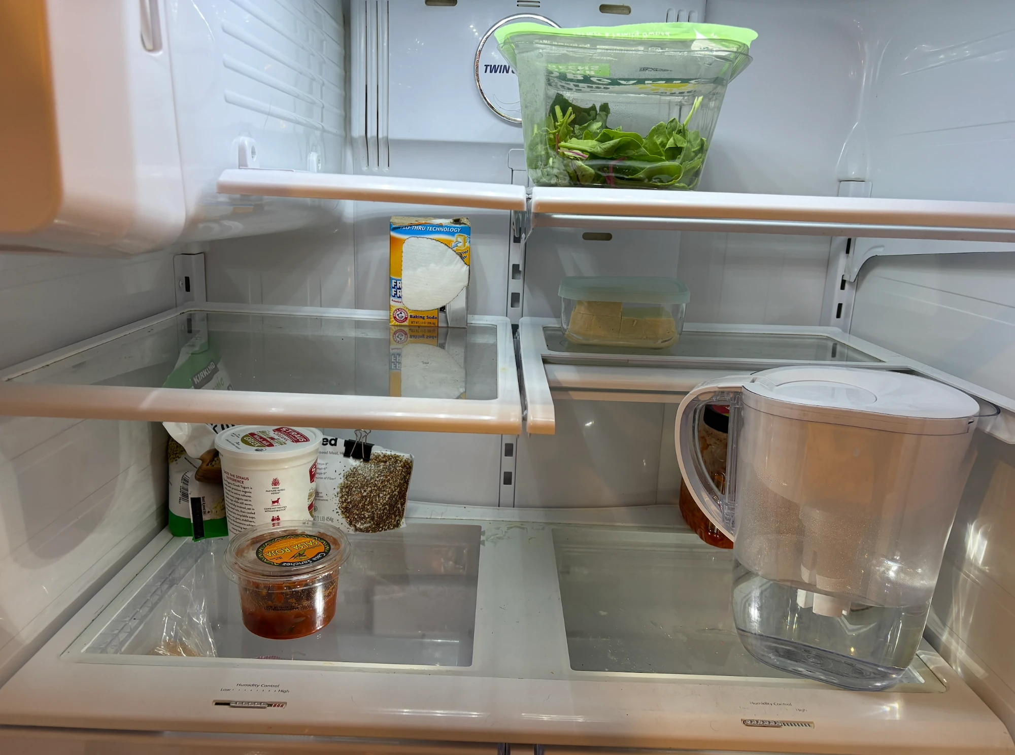 Open refrigerator full of food