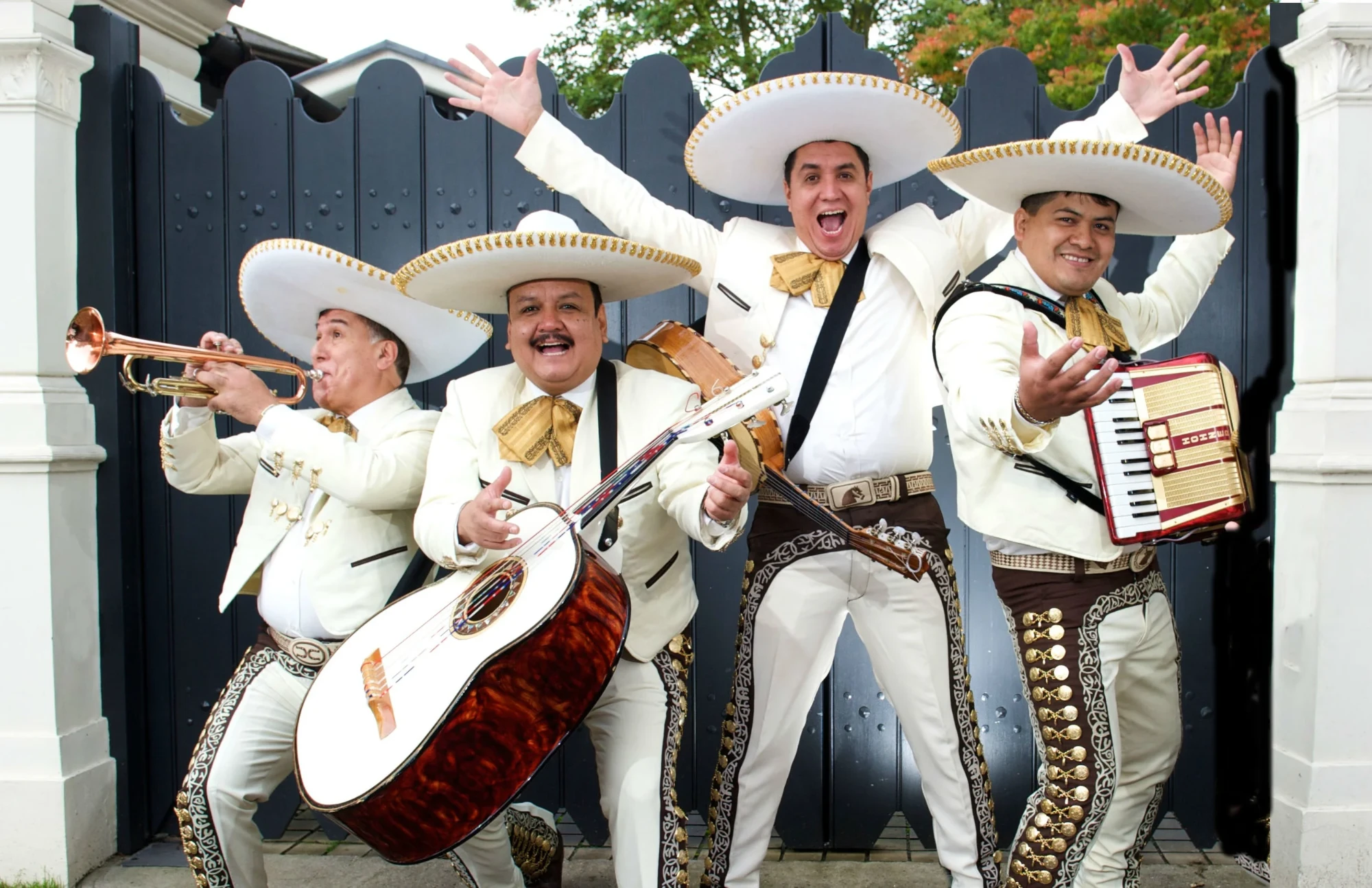 A mariachi band playing instruments
