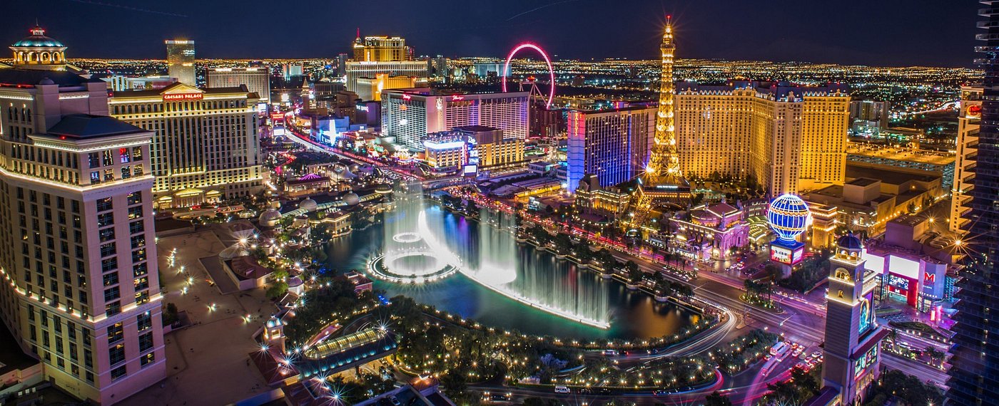 The Bellagio fountains and Las Vegas Strip at night